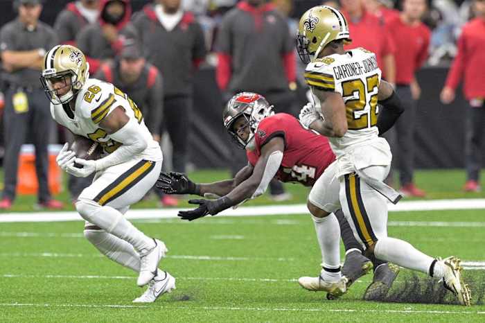 Saints S P.J. Williams (26) returns an interception for the game-clinching touchdown against Tampa Bay. Credit: Nola.com